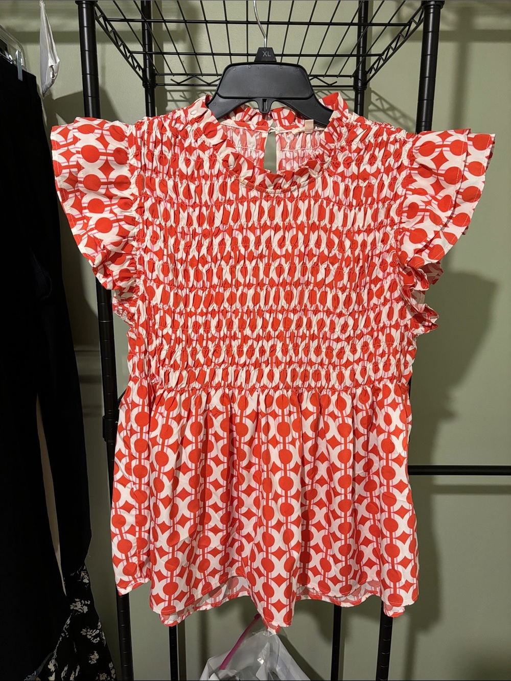 JODIFL Coral and White Geometric Smocked Top